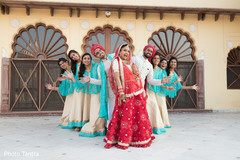 Fun capture of Indian couple with groomsmen and bridesmaids Fun capture of Indian couple with groomsmen and bridesmaids