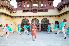 Raja and groomsmen performing a choreography Raja and groomsmen performing a choreography