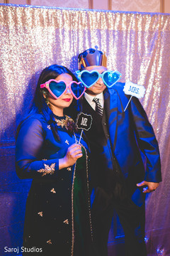 Indian wedding guests in Photo Booth capture. Indian wedding guests in Photo Booth capture.