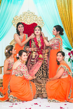 Sweet Indian bride with bridesmaids posing for photo. Sweet Indian bride with bridesmaids posing for photo.
