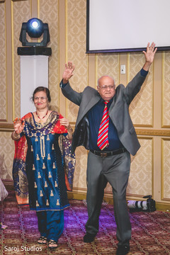 Indian grooms relatives entrance to wedding reception. Indian grooms relatives entrance to wedding reception.