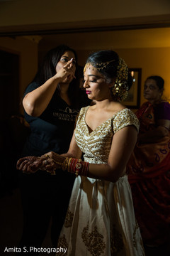 Beautiful Indian bride being dolled up for her ceremony. Beautiful Indian bride being dolled up for her ceremony.