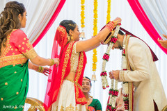 Indian bride placing the garland on the raja Indian bride placing the garland on the raja