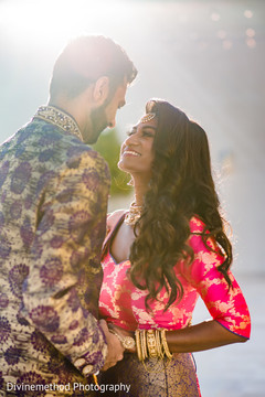 Ravishing Indian bride and grooms out in a garden capture. Ravishing Indian bride and grooms out in a garden capture.