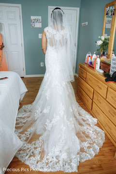 Stunning Indian bride on her white wedding dress capture. Stunning Indian bride on her white wedding dress capture.