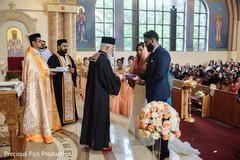 Indian bride and groom getting their wedding rings. Indian bride and groom getting their wedding rings.