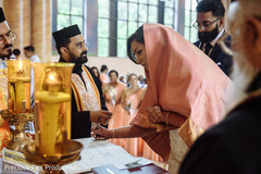 See this lovely indian bride signing wedding contract. See this lovely indian bride signing wedding contract.