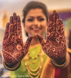 Maharani showing her mehndi design for the camera Maharani showing her mehndi design for the camera