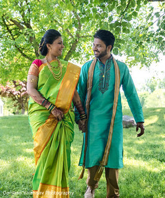 Elegant Indian bride and groom posing for photo shoot. Elegant Indian bride and groom posing for photo shoot.