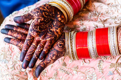 Detail of the dazzling mehndi design on the Indian bride Detail of the dazzling mehndi design on the Indian bride