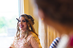 Indian bride glowing in her wedding attire. Indian bride glowing in her wedding attire.