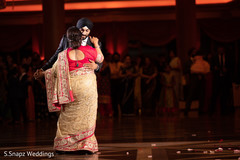 Indian groom dancing during the ceremony Indian groom dancing during the ceremony