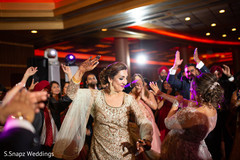 Guests having a blast during the reception at the venue Guests having a blast during the reception at the venue