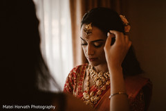Indian bride getting her tikka on. Indian bride getting her tikka on.