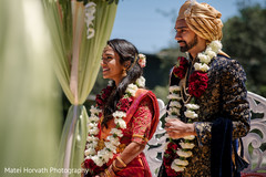 Indian bride and groom at their varmala ritual. Indian bride and groom at their varmala ritual.