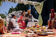 Indian couple making offerings to sacred fire. Indian couple making offerings to sacred fire.