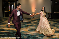 Adorable indian newlyweds making their entrance. Adorable indian newlyweds making their entrance.