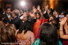 Indian wedding guests rocking the dance floor. Indian wedding guests rocking the dance floor.