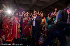 Cheerful indian wedding reception dance. Cheerful indian wedding reception dance.