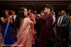 Upbeat Indian guest, bride and groom celebration. Upbeat Indian guest, bride and groom celebration.