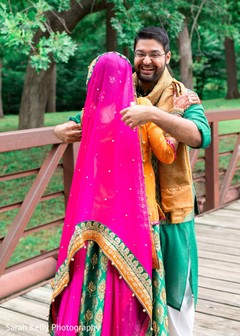 Cheerful raja hugging the beautiful Indian bride Cheerful raja hugging the beautiful Indian bride