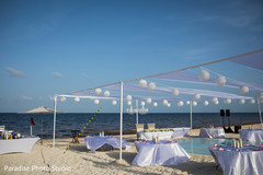 Wonderful Indian wedding reception decor by the beach. Wonderful Indian wedding reception decor by the beach.