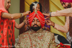 Indian groom on his wedding ceremony turban with jewelry. Indian groom on his wedding ceremony turban with jewelry.
