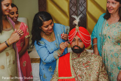 Charming Indian groom getting ready. Charming Indian groom getting ready.