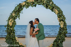 Lovely kiss capture of Indian bride and groom. Lovely kiss capture of Indian bride and groom.