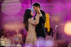Indian bride and groom first dance capture. Indian bride and groom first dance capture.