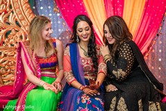 Maharani showing her mehndi to the beautiful bridesmaids Maharani showing her mehndi to the beautiful bridesmaids
