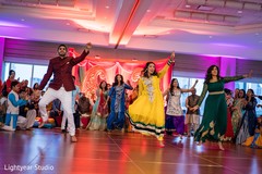 Indian guests performing a choreography during the sangeet Indian guests performing a choreography during the sangeet