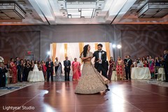 Indian newlyweds enjoying their first dance together Indian newlyweds enjoying their first dance together