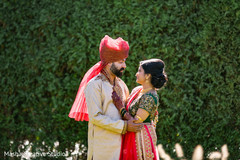 Indian bride and groom romantic first glance Indian bride and groom romantic first glance