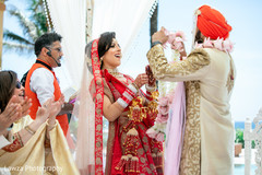 Indian bride and groom at their Jaimala Ceremony. Indian bride and groom at their Jaimala Ceremony.