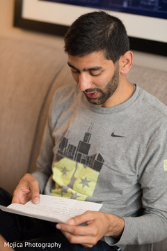 Indian groom reading the maharani's message Indian groom reading the maharani's message