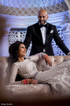Smiling maharani posing with Raja at the ceremony Smiling maharani posing with Raja at the ceremony