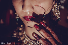 Detail of mehndi design and Indian bridal jewelry Detail of mehndi design and Indian bridal jewelry