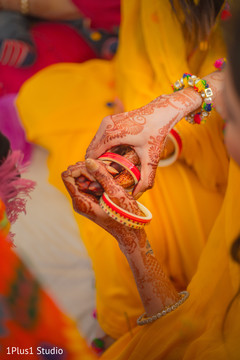 Details of the mehndi design on the guests hands Details of the mehndi design on the guests hands