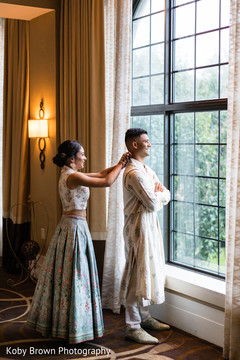 Indian bride and groom with their pre-wedding outfits. Indian bride and groom with their pre-wedding outfits.