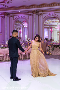 Indian bride and groom magical first dance scene. Indian bride and groom magical first dance scene.
