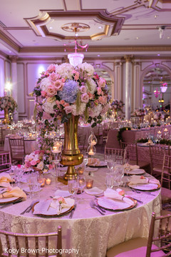 Dreamlike Indian wedding reception table setup. Dreamlike Indian wedding reception table setup.