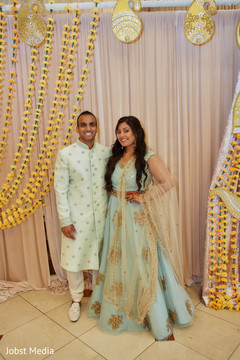 Indian bride and groom looking at camera capture. Indian bride and groom looking at camera capture.
