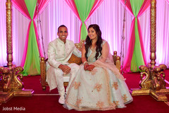 Adorable indian couple posing at the mehndi stage. Adorable indian couple posing at the mehndi stage.