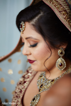 Indian bride getting her Ghoonghat on. Indian bride getting her Ghoonghat on.