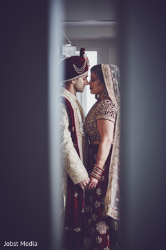 Sweet Indian bride and groom's first look scene. Sweet Indian bride and groom's first look scene.