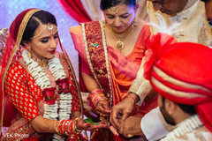 Capture of a moment during the Indian wedding rituals Capture of a moment during the Indian wedding rituals