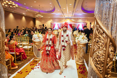 Indian couple as they leave the ceremony venue Indian couple as they leave the ceremony venue