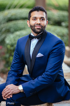 Elegant Indian groom posing for photo shoot Elegant Indian groom posing for photo shoot