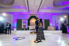 Indian bride and groom dancing at the reception Indian bride and groom dancing at the reception